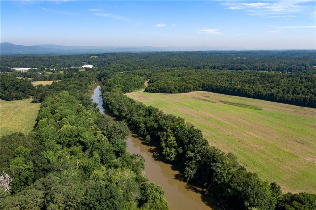 669 Nicklesville Road Northeast Resaca, GA 30735 - Photo 40 of 60 a view of a lake with a city