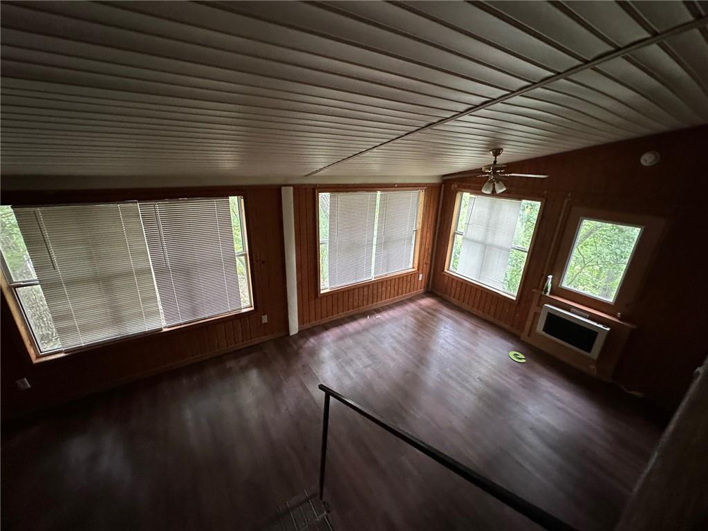 669 Nicklesville Road Northeast Resaca, GA 30735 - Photo 48 of 60 a view of an empty room with wooden floor and a window