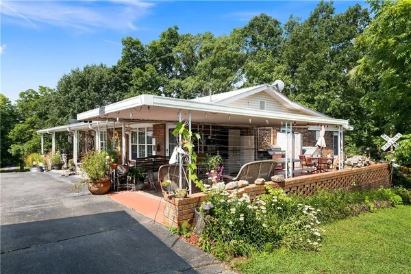 an aerial view of a house with a garden