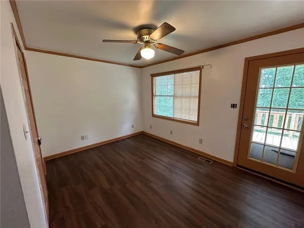 a kitchen with a stove a sink and a refrigerator
