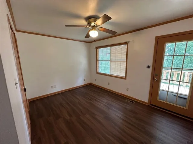 a kitchen with a stove a sink and a refrigerator