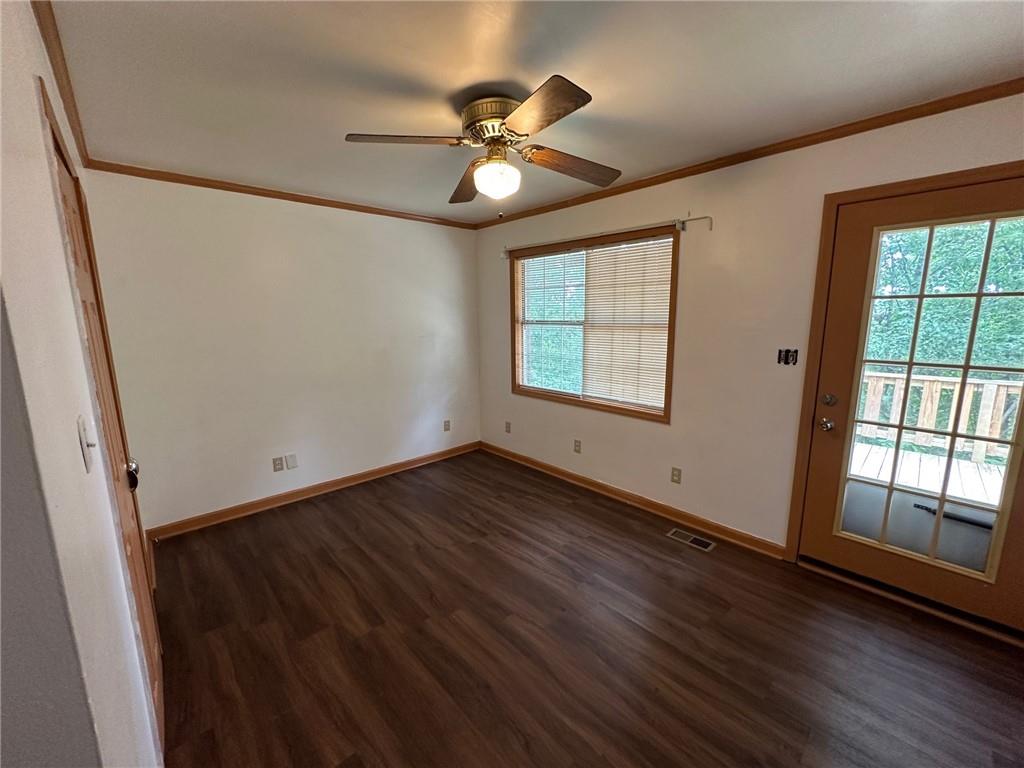 669 Nicklesville Road Northeast Resaca, GA 30735 - Photo 55 of 60 a view of an empty room with wooden floor and a window