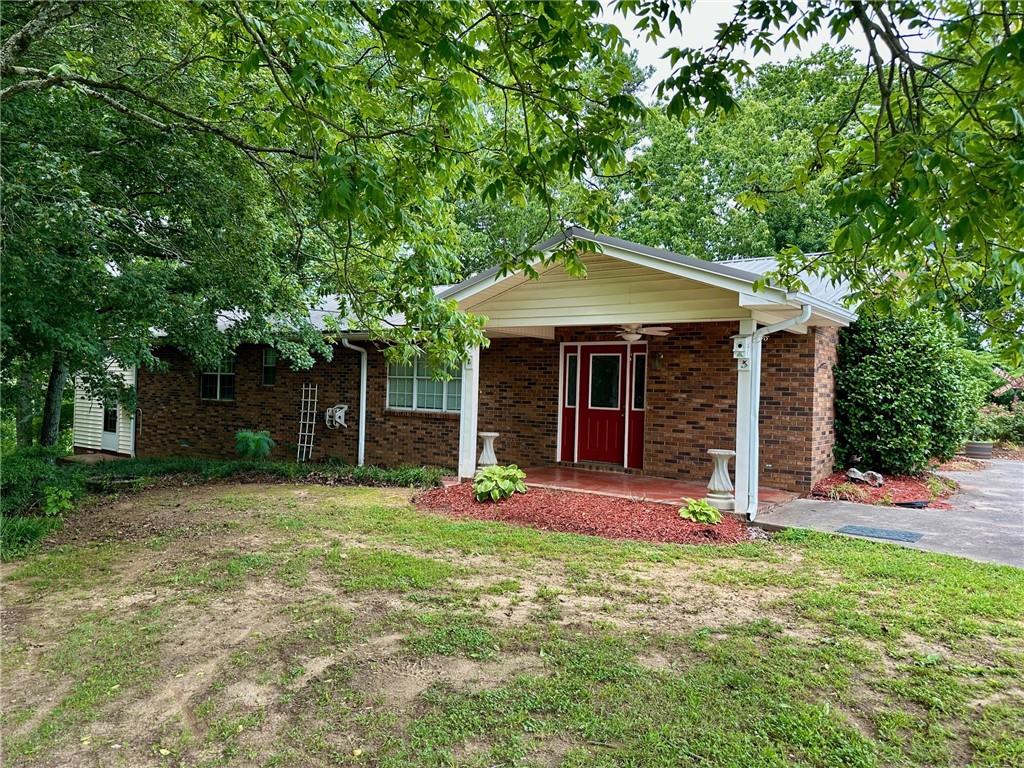669 Nicklesville Road Northeast Resaca, GA 30735 - Photo 60 of 60 front view of a house with a yard
