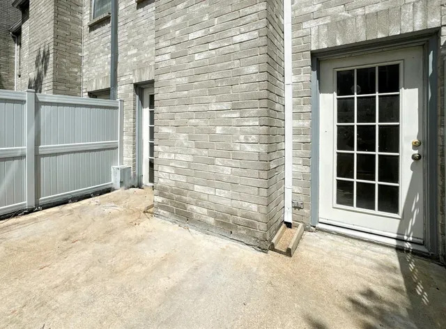 a view of empty room with windows