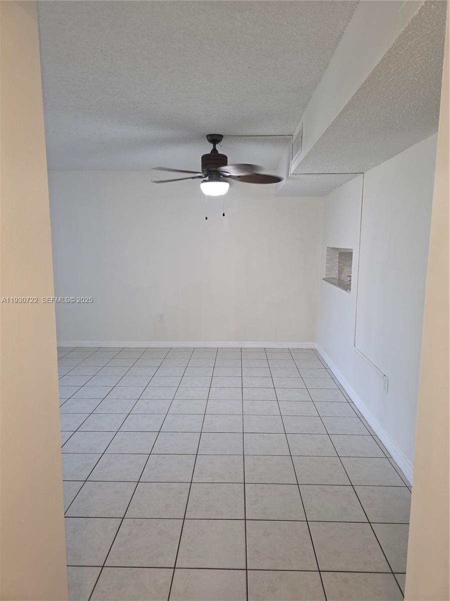 8075 Southwest 107th Avenue, Unit 210 Miami, FL 33173 - Photo 8 of 33 HALLWAY LEADING TO THE BEDROOMS AND BATHS