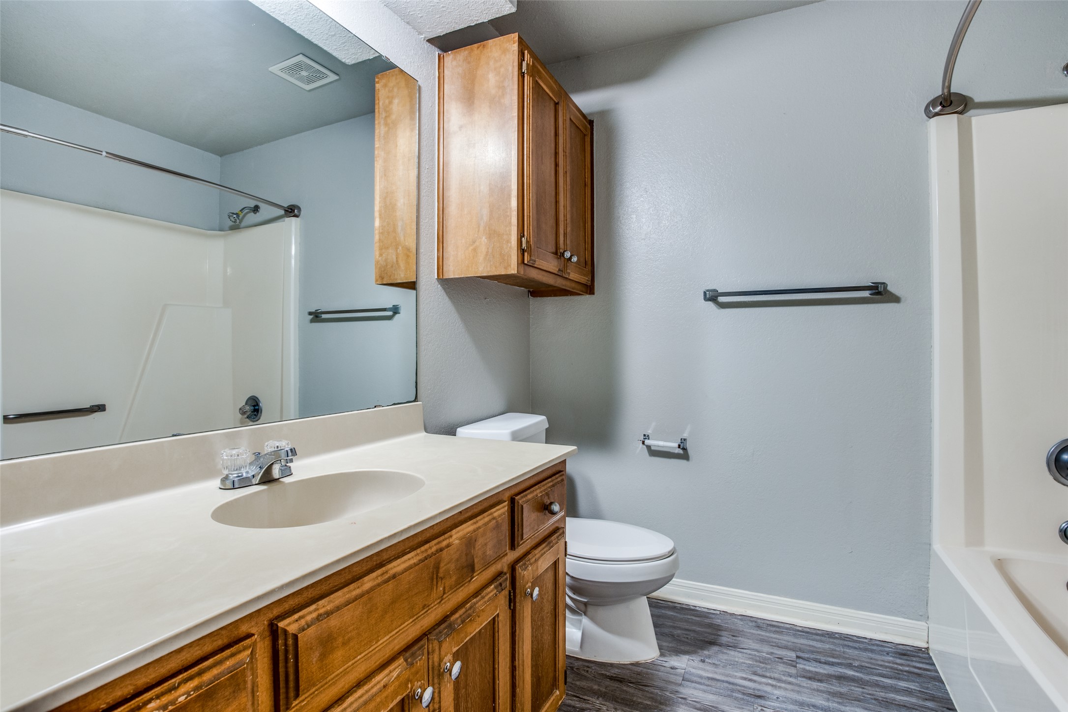 106 Verna Spur, Unit B Georgetown, TX 78628 - Photo 18 of 25 A well-appointed bath features a sleek vanity and ample storage.