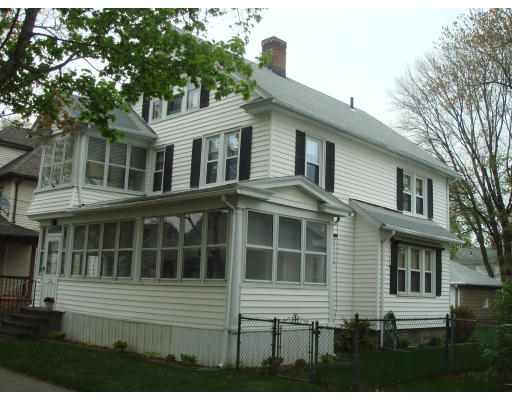 77 Sunapee Street Springfield, MA 01108 - Photo 1 of 28 a front view of a house with a yard