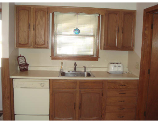 77 Sunapee Street Springfield, MA 01108 - Photo 11 of 28 a bathroom with a sink and a mirror