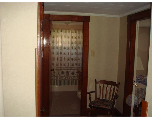 77 Sunapee Street Springfield, MA 01108 - Photo 15 of 28 a bathroom with a glass door