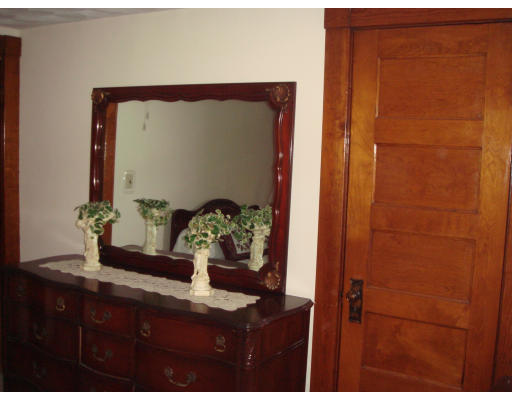 77 Sunapee Street Springfield, MA 01108 - Photo 19 of 28 a bathroom with a granite countertop sink and a mirror