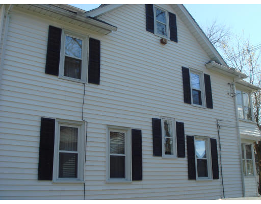 77 Sunapee Street Springfield, MA 01108 - Photo 27 of 28 a view of a house with wooden deck