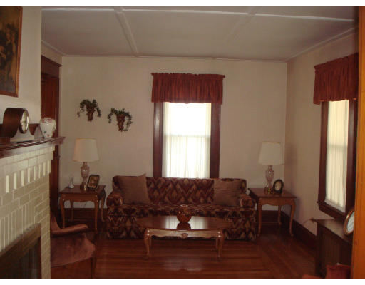 77 Sunapee Street Springfield, MA 01108 - Photo 5 of 28 a living room with furniture and a window