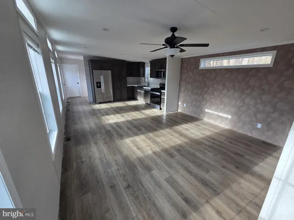 a view of livingroom with furniture and wooden floor