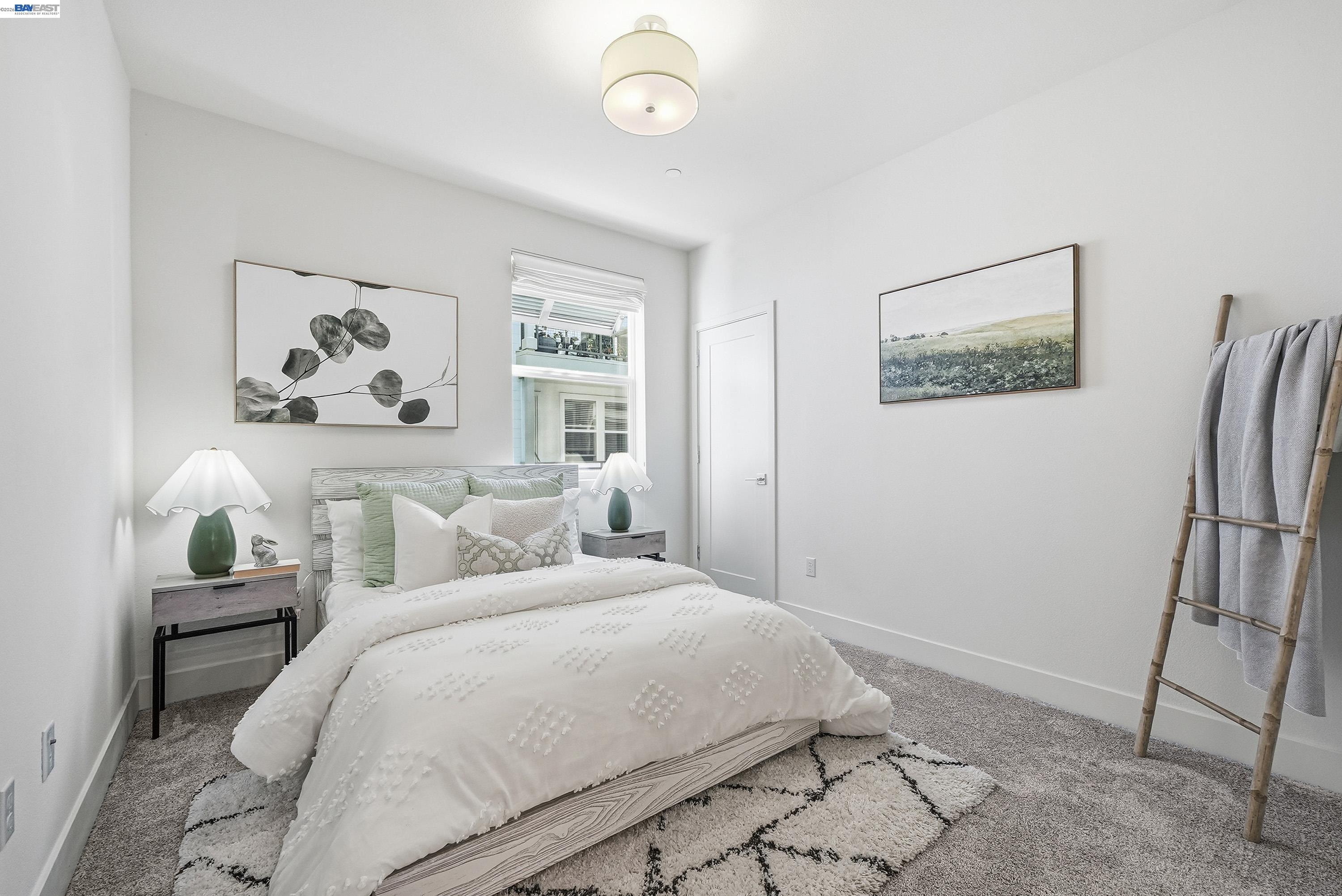 9620 Seawind Way Newark, CA 94560 - Photo 15 of 55 a bedroom with a bed and a painting on the wall