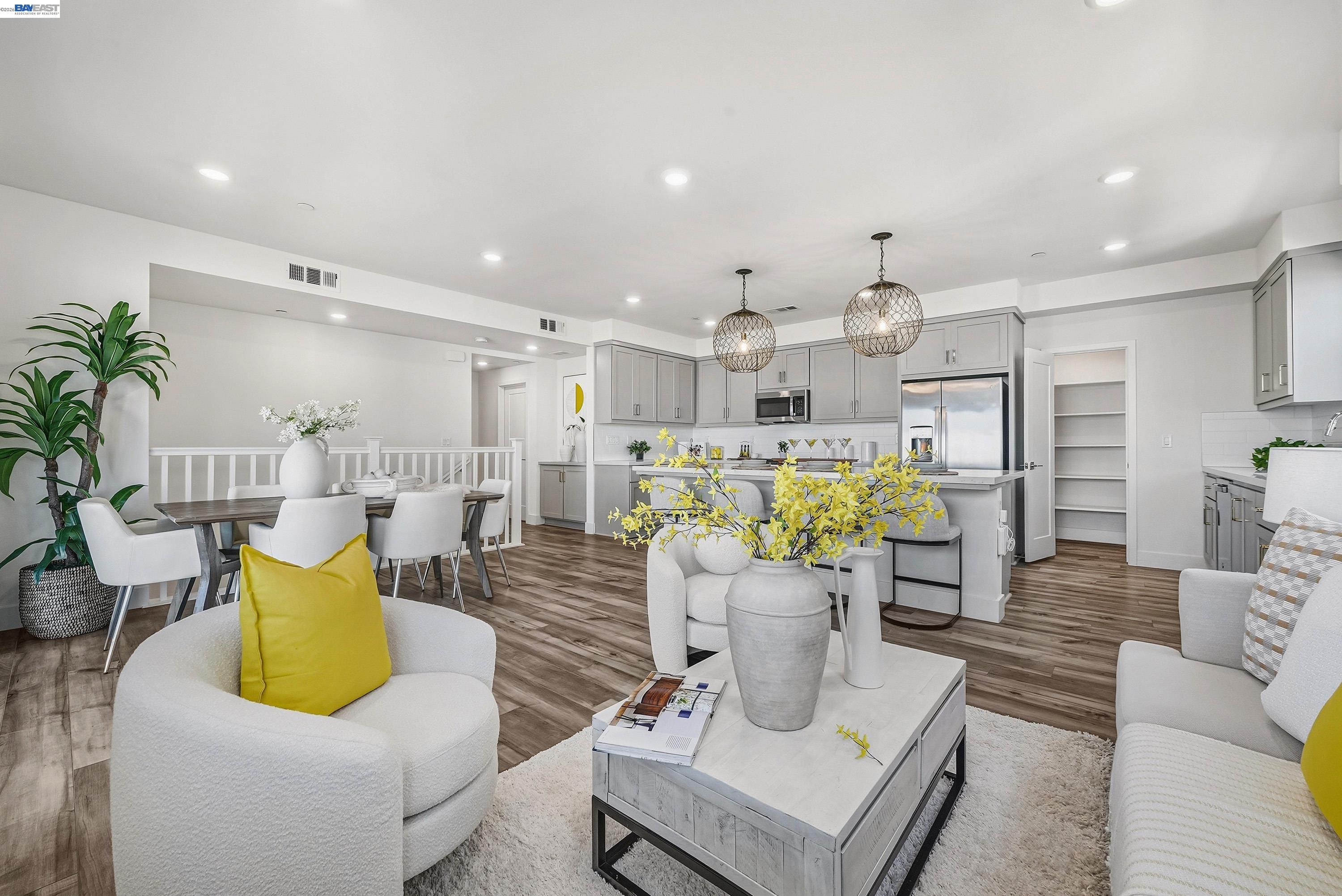 9620 Seawind Way Newark, CA 94560 - Photo 2 of 55 a living room with furniture kitchen and a table
