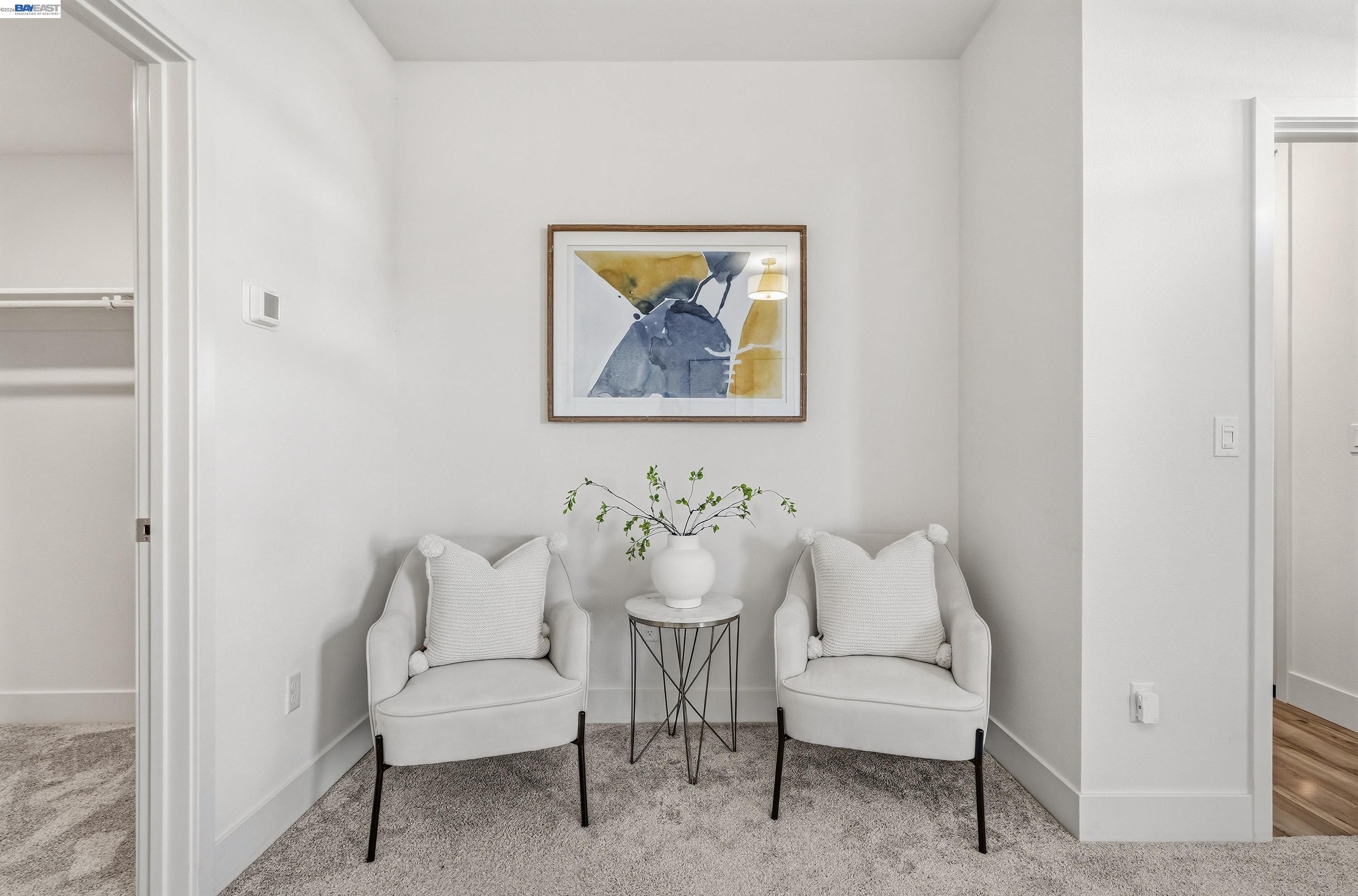 9620 Seawind Way Newark, CA 94560 - Photo 25 of 55 a view of a hallway with chairs
