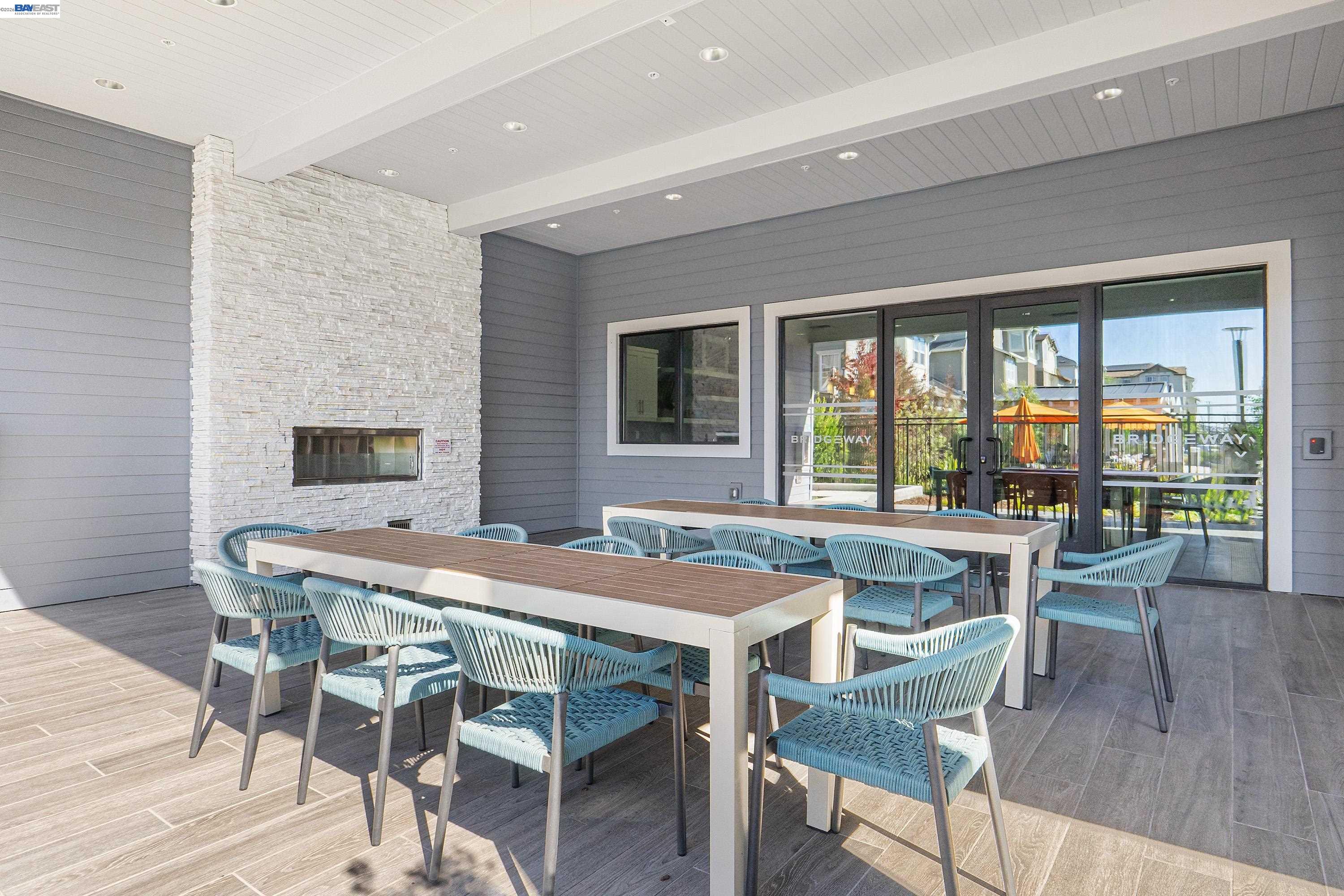 9620 Seawind Way Newark, CA 94560 - Photo 39 of 55 a dining room with furniture window and wooden floor