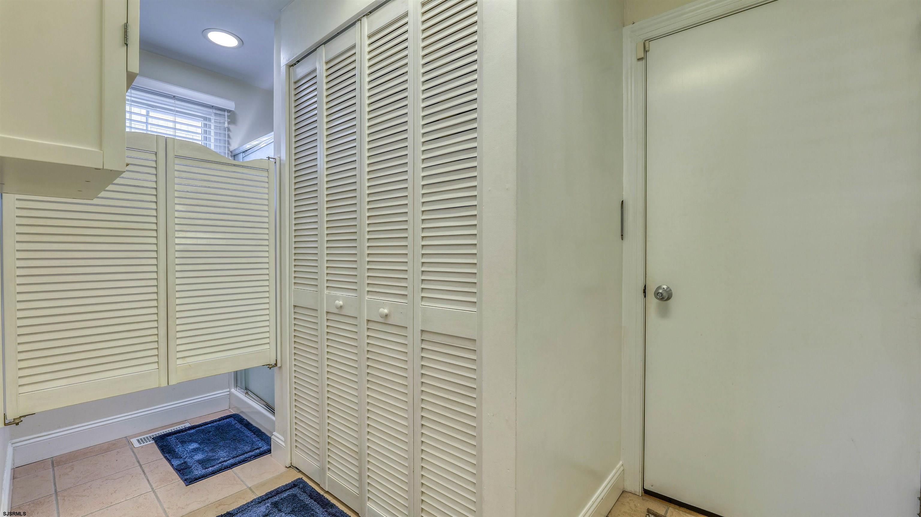 119 North Belmont Avenue, Unit AUGUST LABOR DAY Margate City, NJ 08402 - Photo 13 of 35 a view of wooden floor in a bathroom