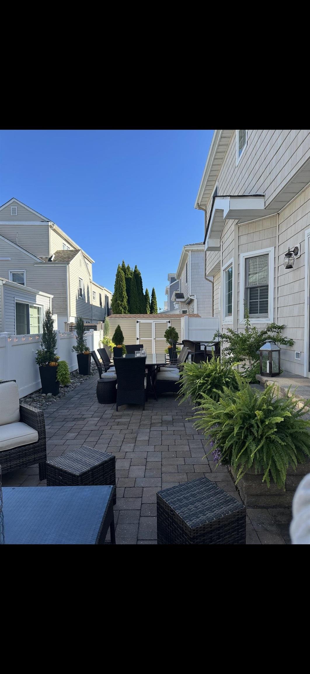 119 North Belmont Avenue, Unit AUGUST LABOR DAY Margate City, NJ 08402 - Photo 32 of 35 a aerial view of a house with a yard