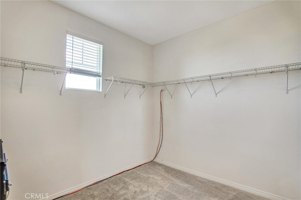 9350 Dauchy Avenue Riverside, CA 92508 - Photo 24 of 34 1 of 2 large closets in Primary bedroom.