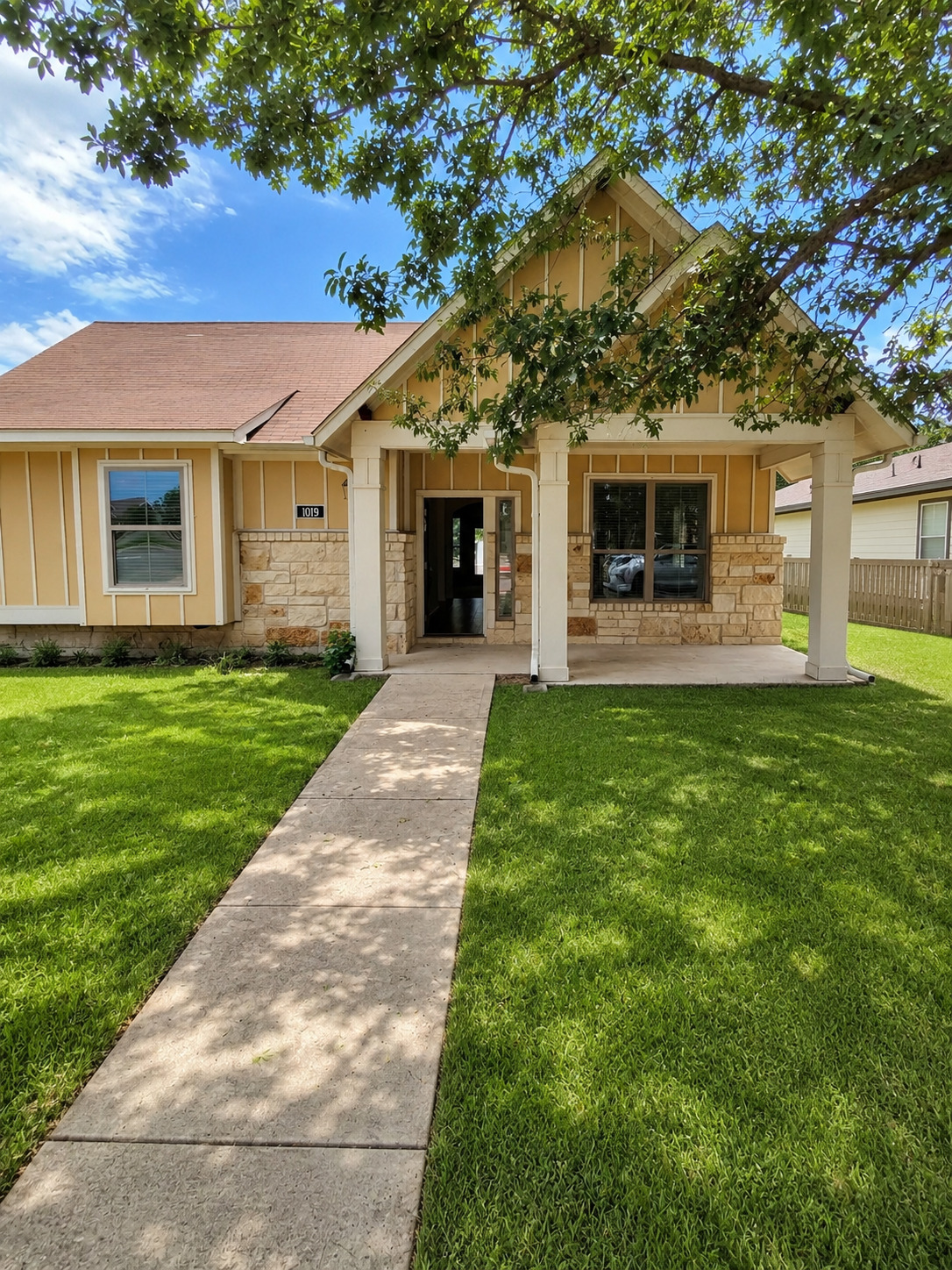 1019 Powell Kyle, TX 78640 - Photo 1 of 14 Grass enhanced with AI