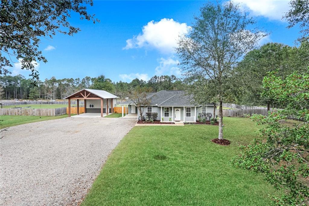 22513 Strain Road Mandeville, LA 70471 - Photo 1 of 17