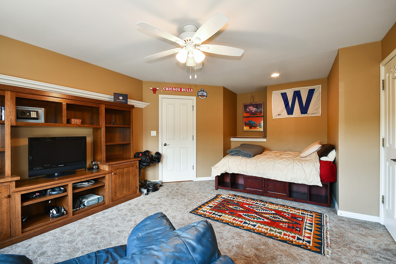 37W488 Grey Barn Road St. Charles, IL 60175 - Photo 17 of 25 a bedroom with a bed and a flat screen tv