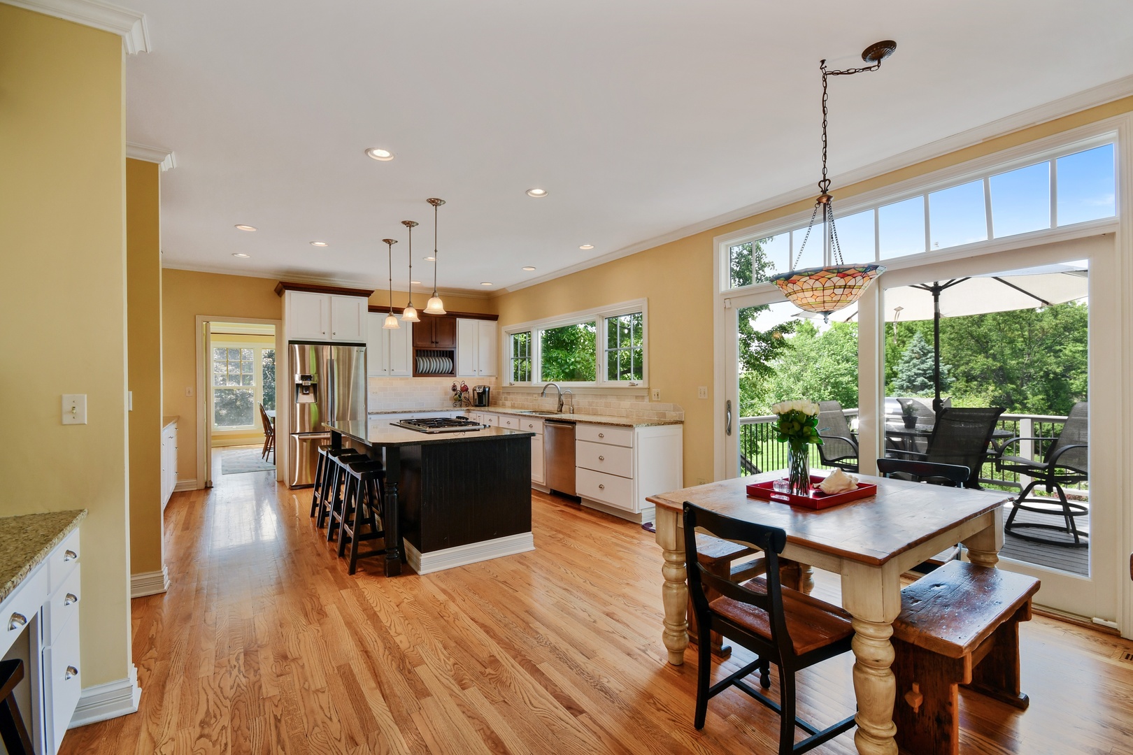 37W488 Grey Barn Road St. Charles, IL 60175 - Photo 5 of 25 a kitchen with a table and chairs in it