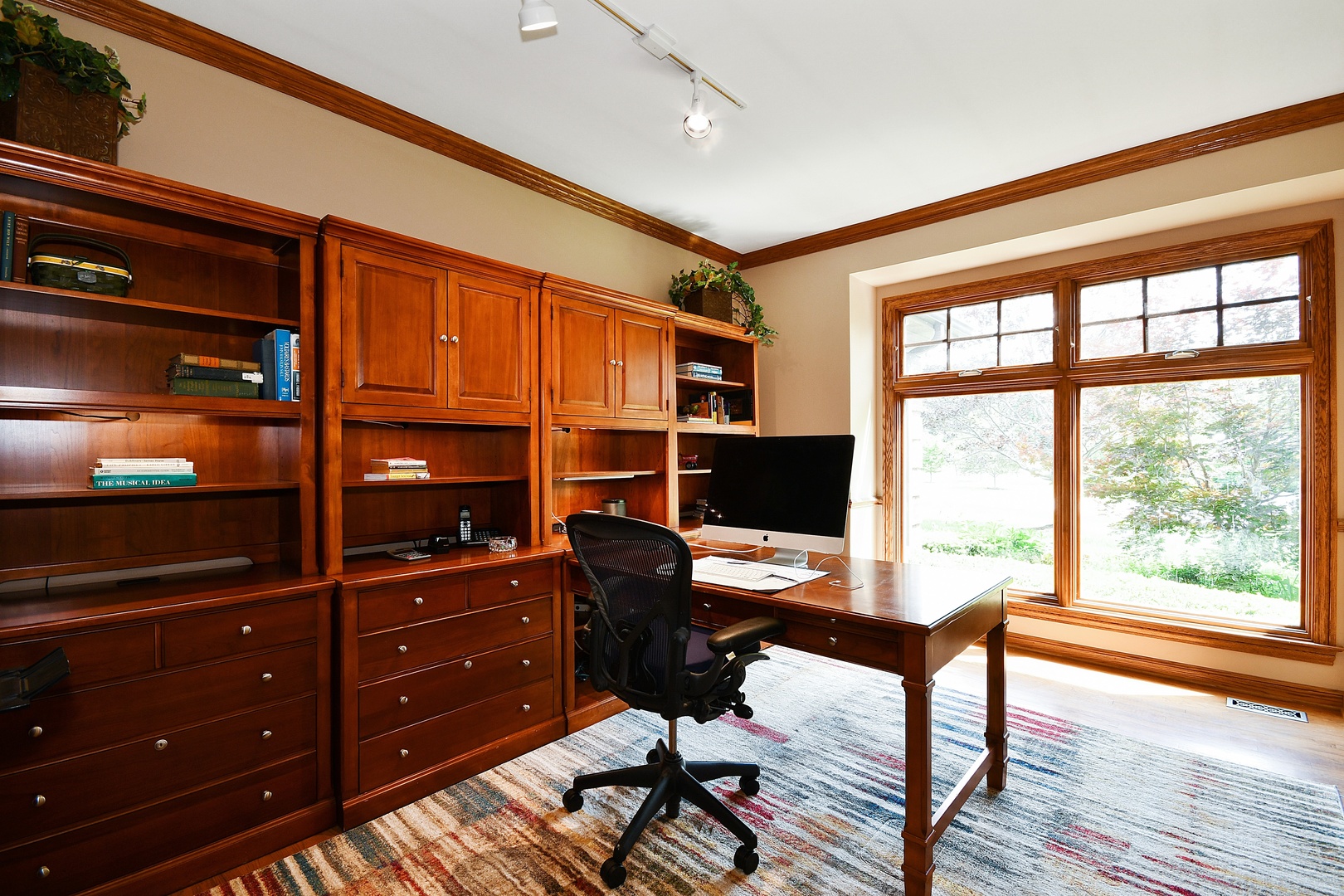 37W488 Grey Barn Road St. Charles, IL 60175 - Photo 10 of 25 a view of a workspace with furniture and a window