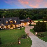 an aerial view of a house with a garden