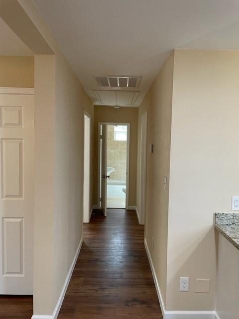 5603 Pickfair Street Houston, TX 77026 - Photo 18 of 22 a view of a hallway with wooden floor