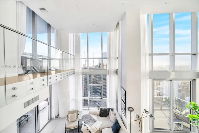 a spacious bathroom with a bathtub and shower