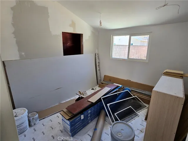 a room with furniture and a flat screen tv