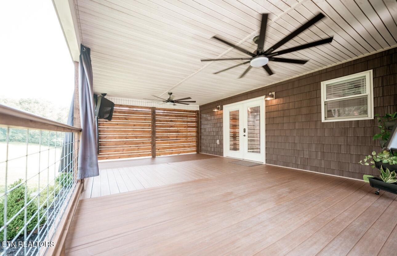630 Peach Orchard Road Clinton, TN 37716 - Photo 12 of 43 covered back porch