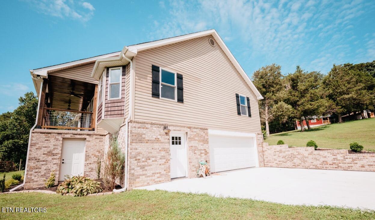 630 Peach Orchard Road Clinton, TN 37716 - Photo 3 of 43 side view