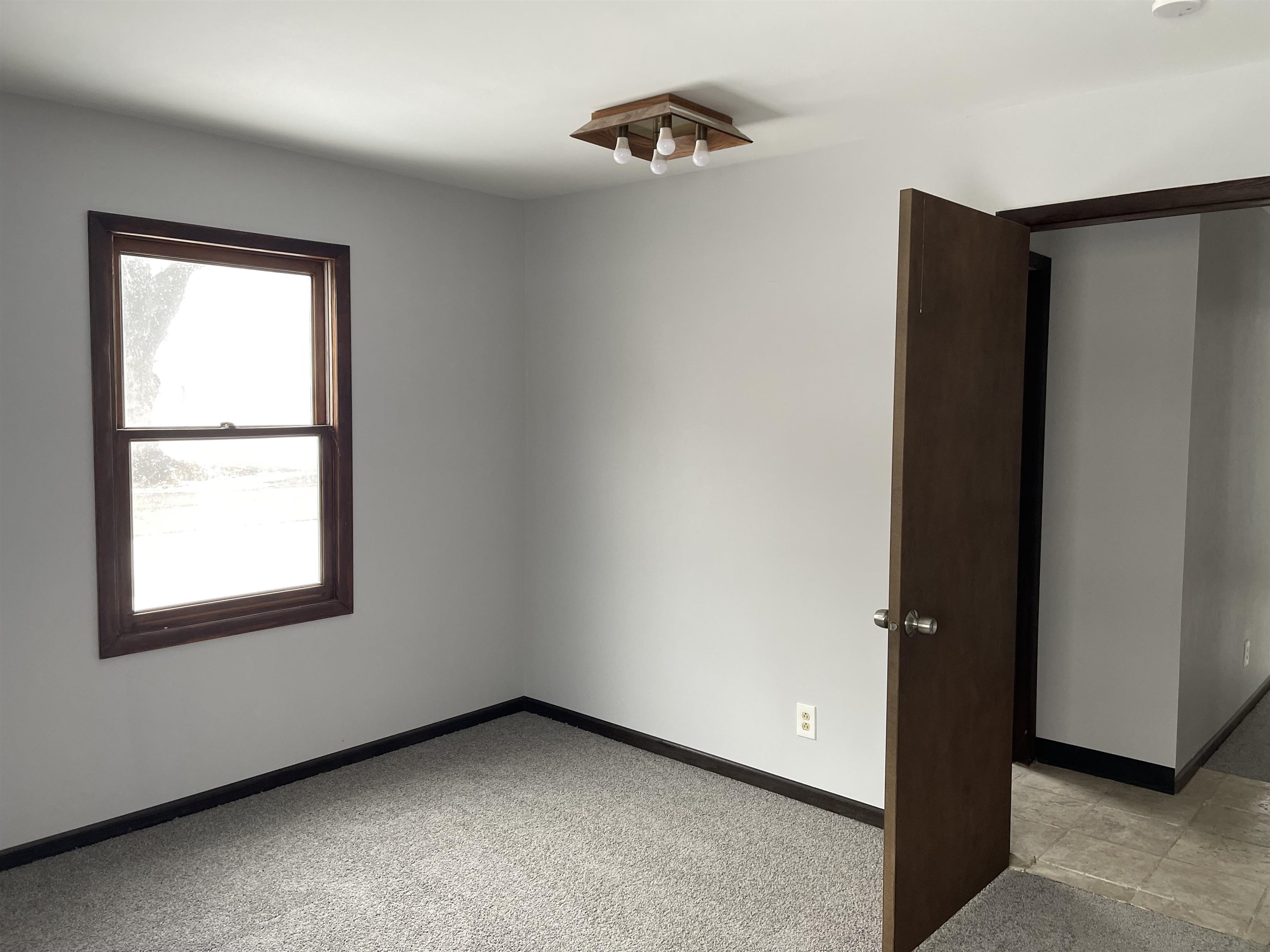7870 Freeport Road Rockton, IL 61072 - Photo 11 of 22 a view of an empty room with a window