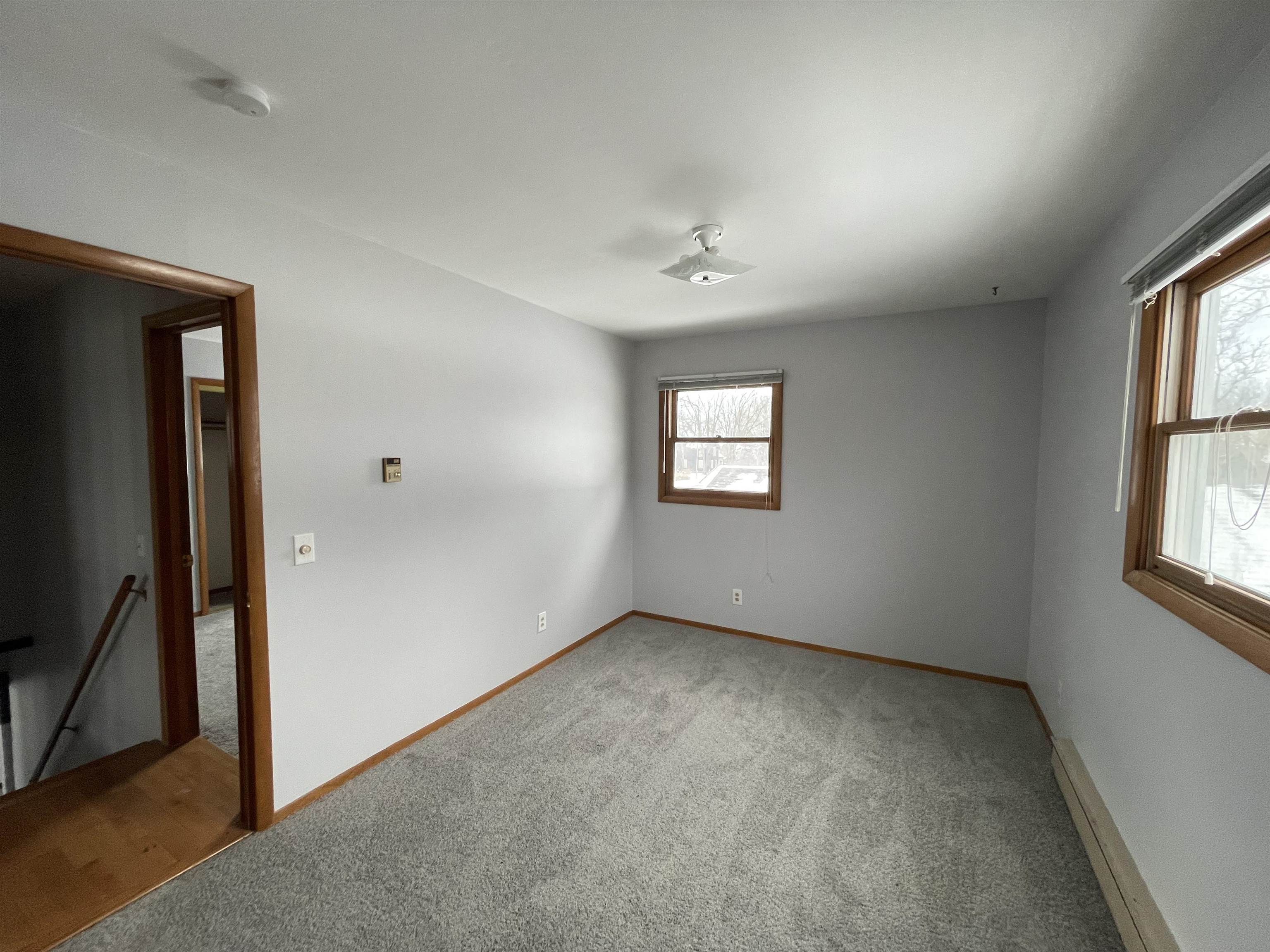 7870 Freeport Road Rockton, IL 61072 - Photo 14 of 22 an empty room with windows