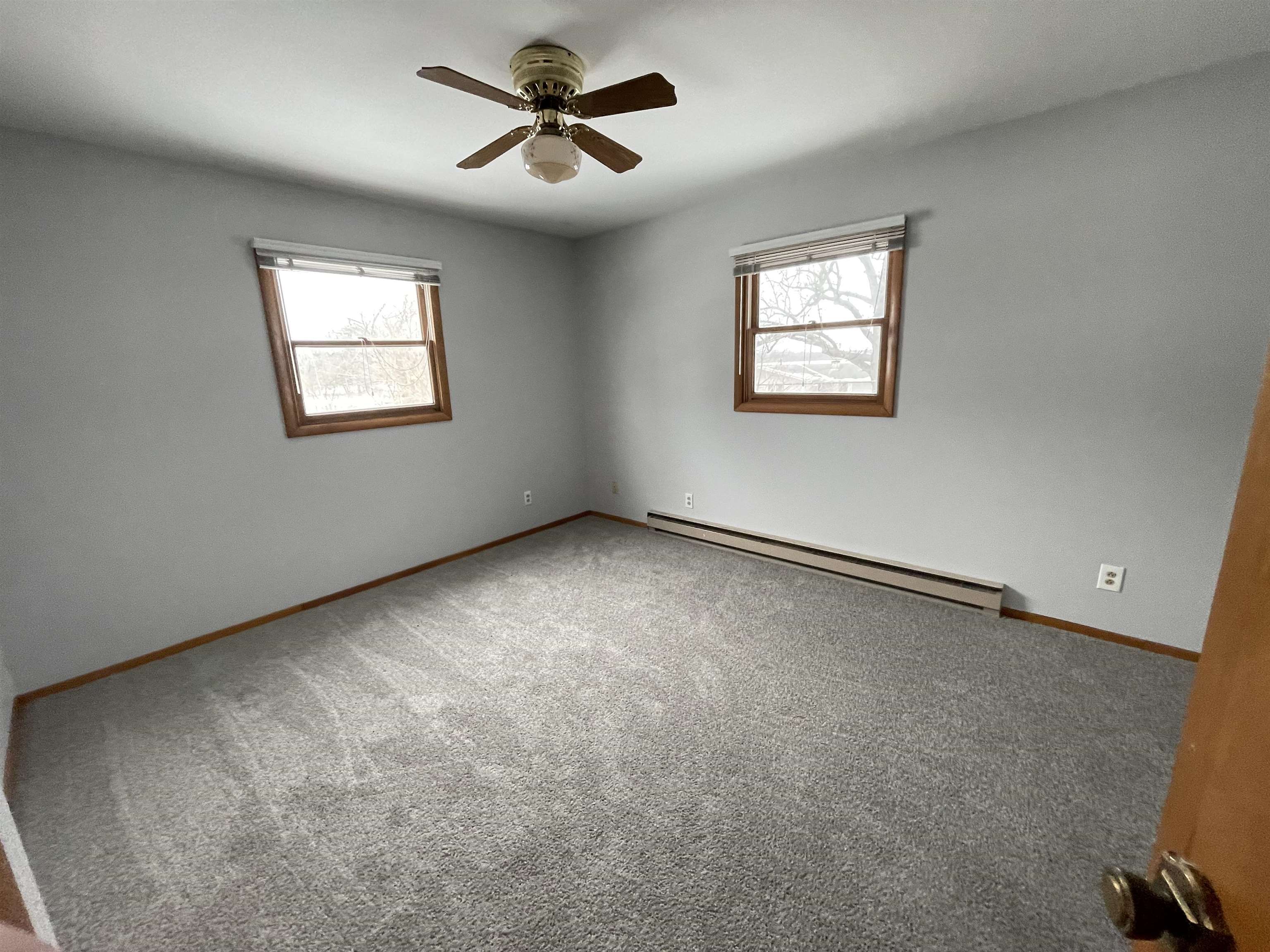 7870 Freeport Road Rockton, IL 61072 - Photo 16 of 22 a view of an empty room with a window