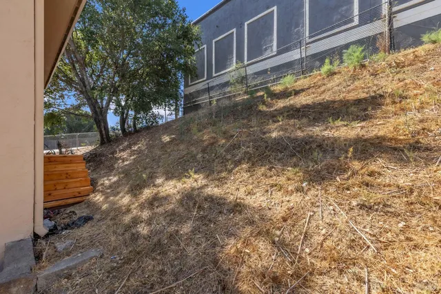 a kitchen with a refrigerator and a sink