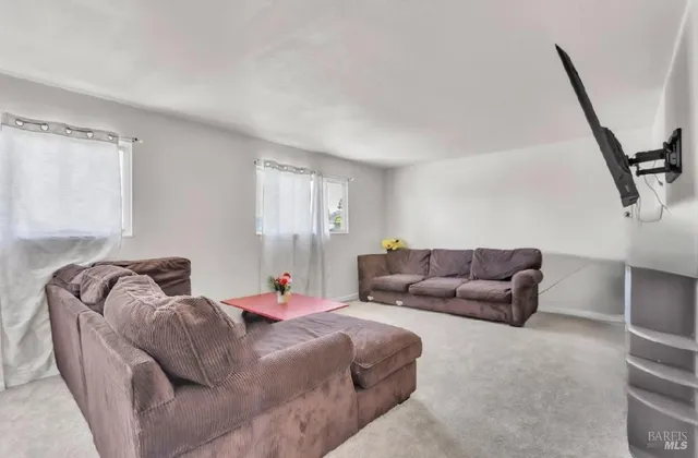 a bedroom with furniture and a couch