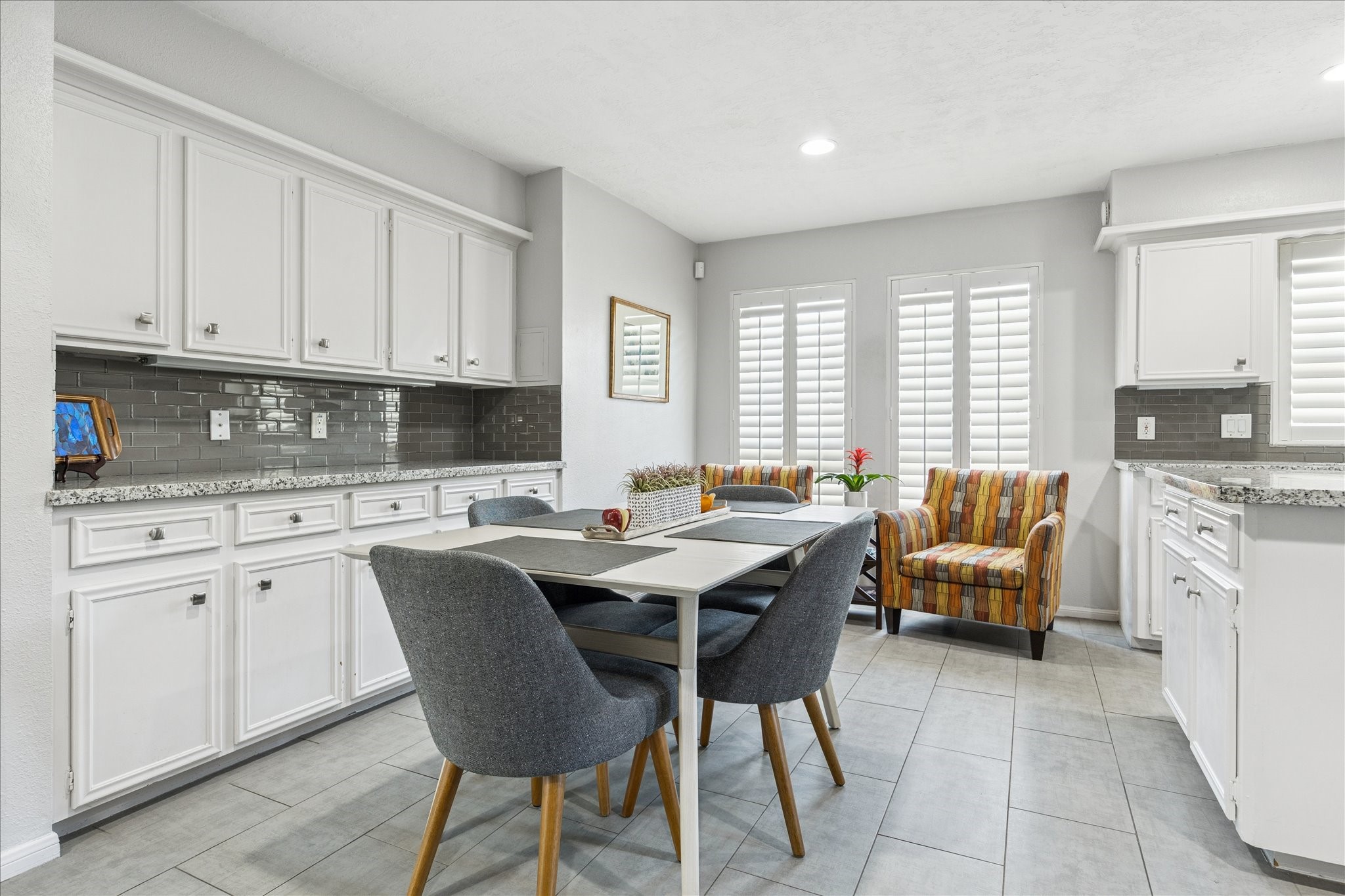 2930 Teague Road Houston, TX 77080 - Photo 12 of 22 a kitchen with a table chairs sink and cabinets