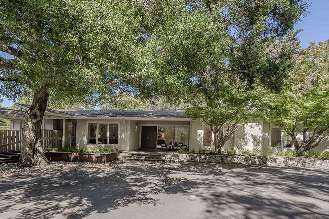 745 Bromfield Road Hillsborough, CA 94010 - Photo 2 of 42 a view of a house with a patio
