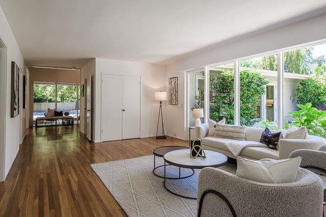 745 Bromfield Road Hillsborough, CA 94010 - Photo 33 of 42 a living room with furniture and a large window