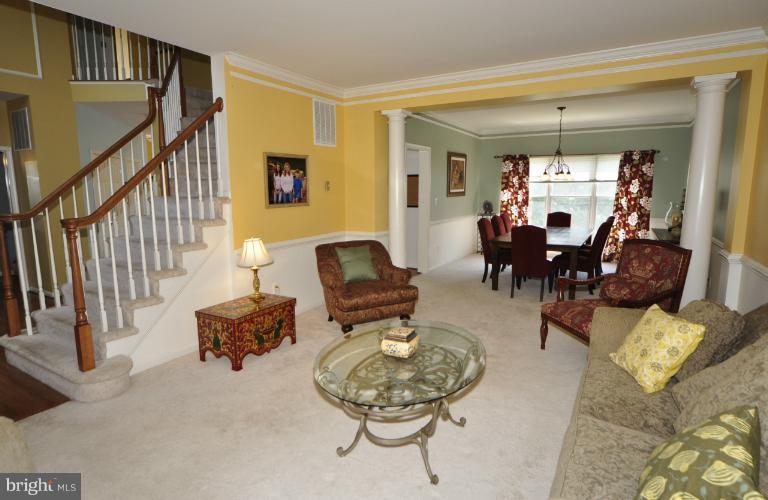 1338 Dasher Lane Reston, VA 20190 - Photo 19 of 24 a living room with furniture and a window