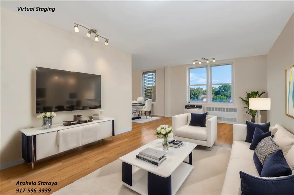 2711 Avenue X, Unit 3A Brooklyn, NY 11235 - Photo 1 of 21 a living room with furniture and a flat screen tv