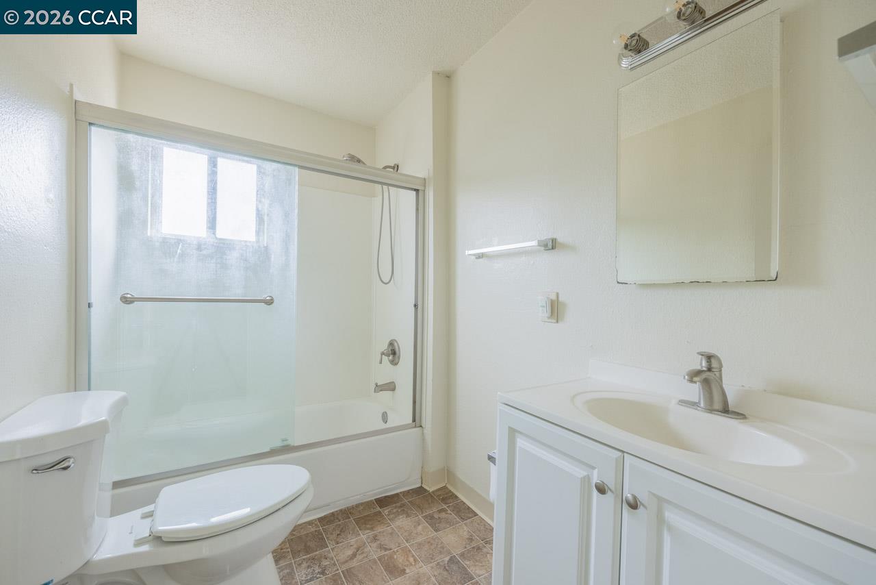 6118 Rutland Drive Carmichael, CA 95608 - Photo 14 of 19 a bathroom with a sink a toilet and shower