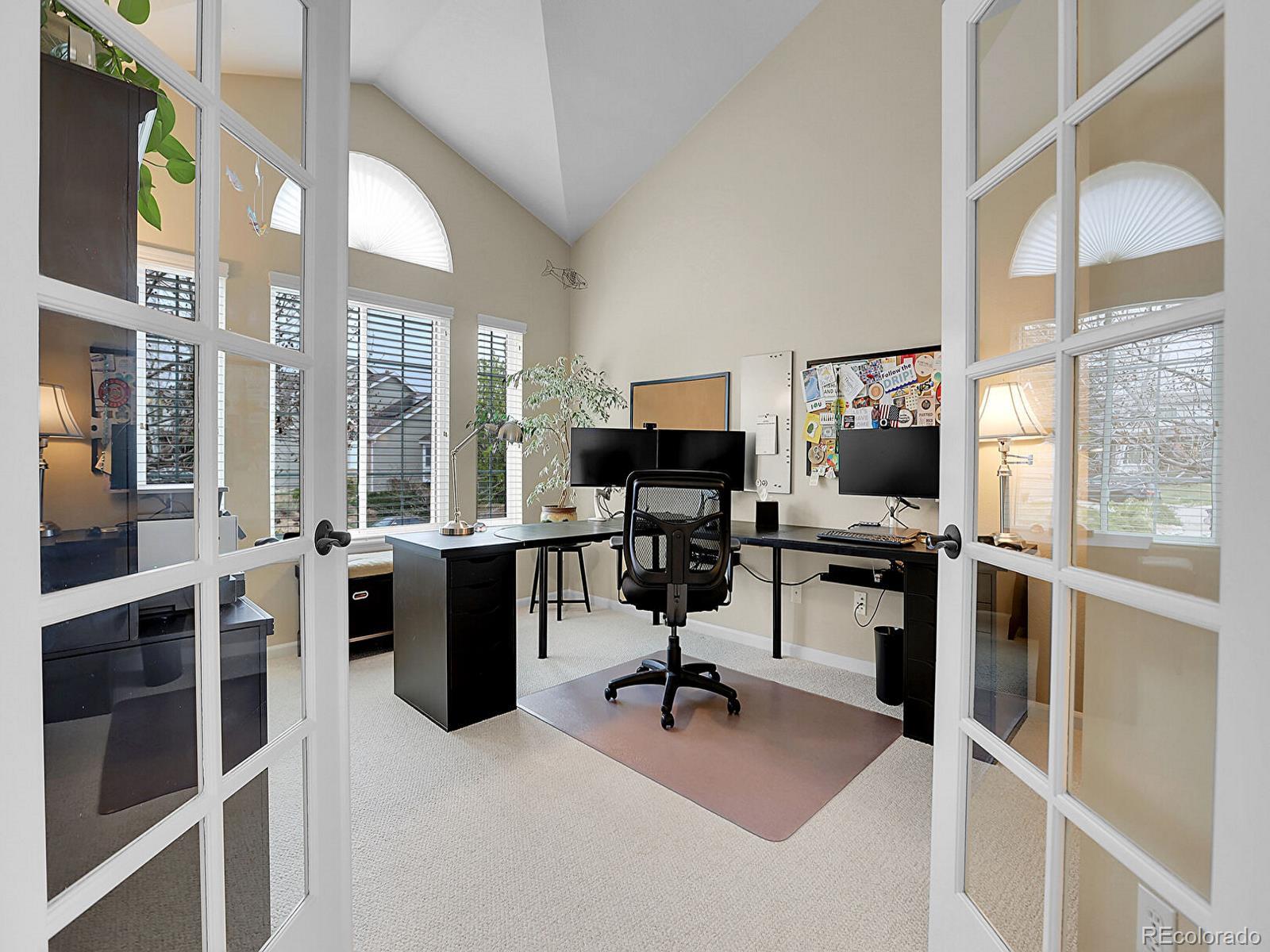 7138 Mountain Brush Circle Highlands Ranch, CO 80130 - Photo 17 of 50 a view of a livingroom with workspace and a window