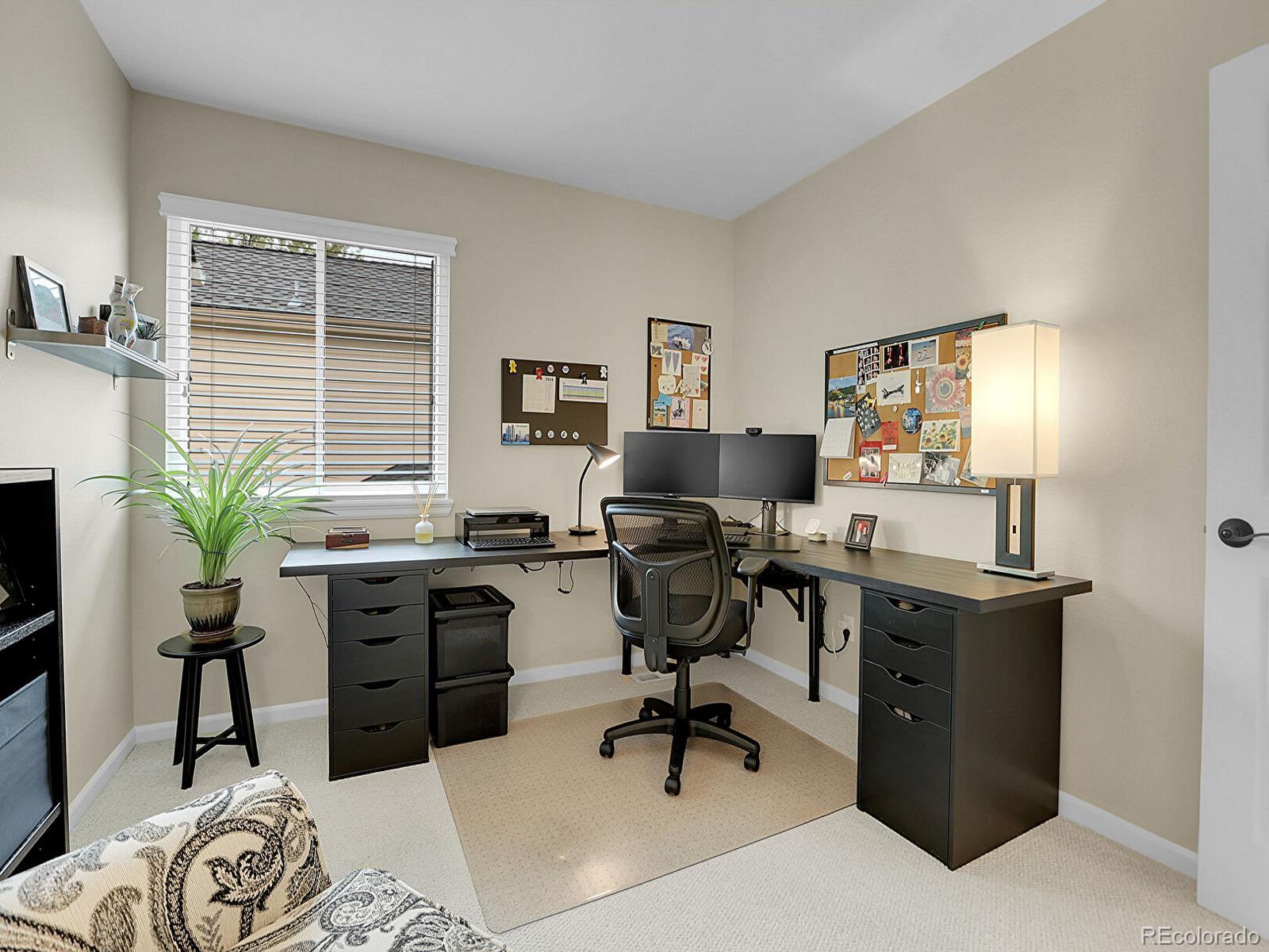 7138 Mountain Brush Circle Highlands Ranch, CO 80130 - Photo 29 of 50 a view of a workspace with furniture and a window