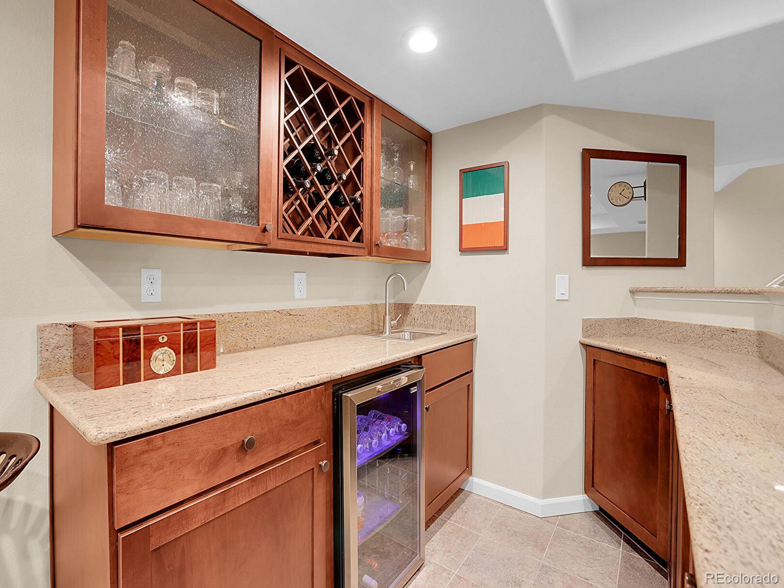 7138 Mountain Brush Circle Highlands Ranch, CO 80130 - Photo 38 of 50 a hallway with painting on the wall