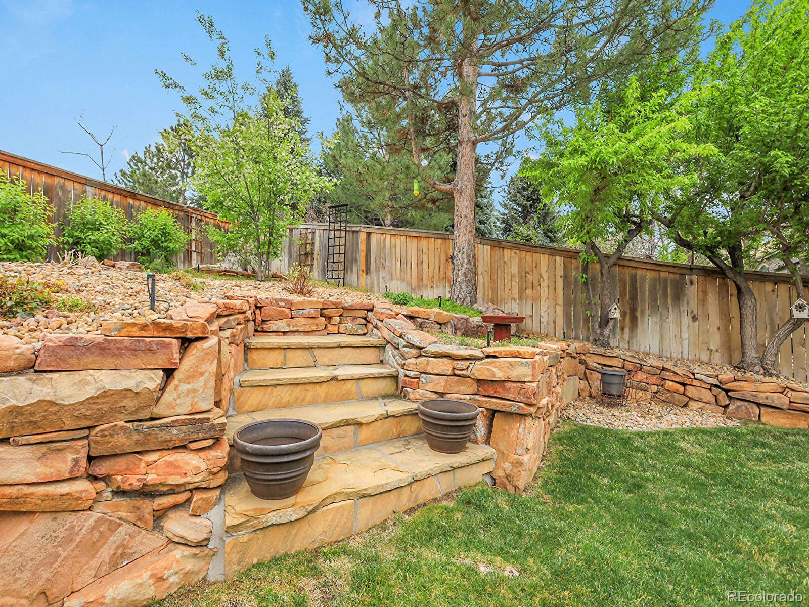 7138 Mountain Brush Circle Highlands Ranch, CO 80130 - Photo 45 of 50 a view of a backyard with sitting area